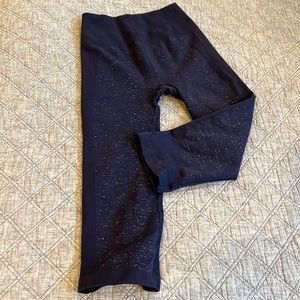 Lululemon navy/dark purple color with specs of white leggings